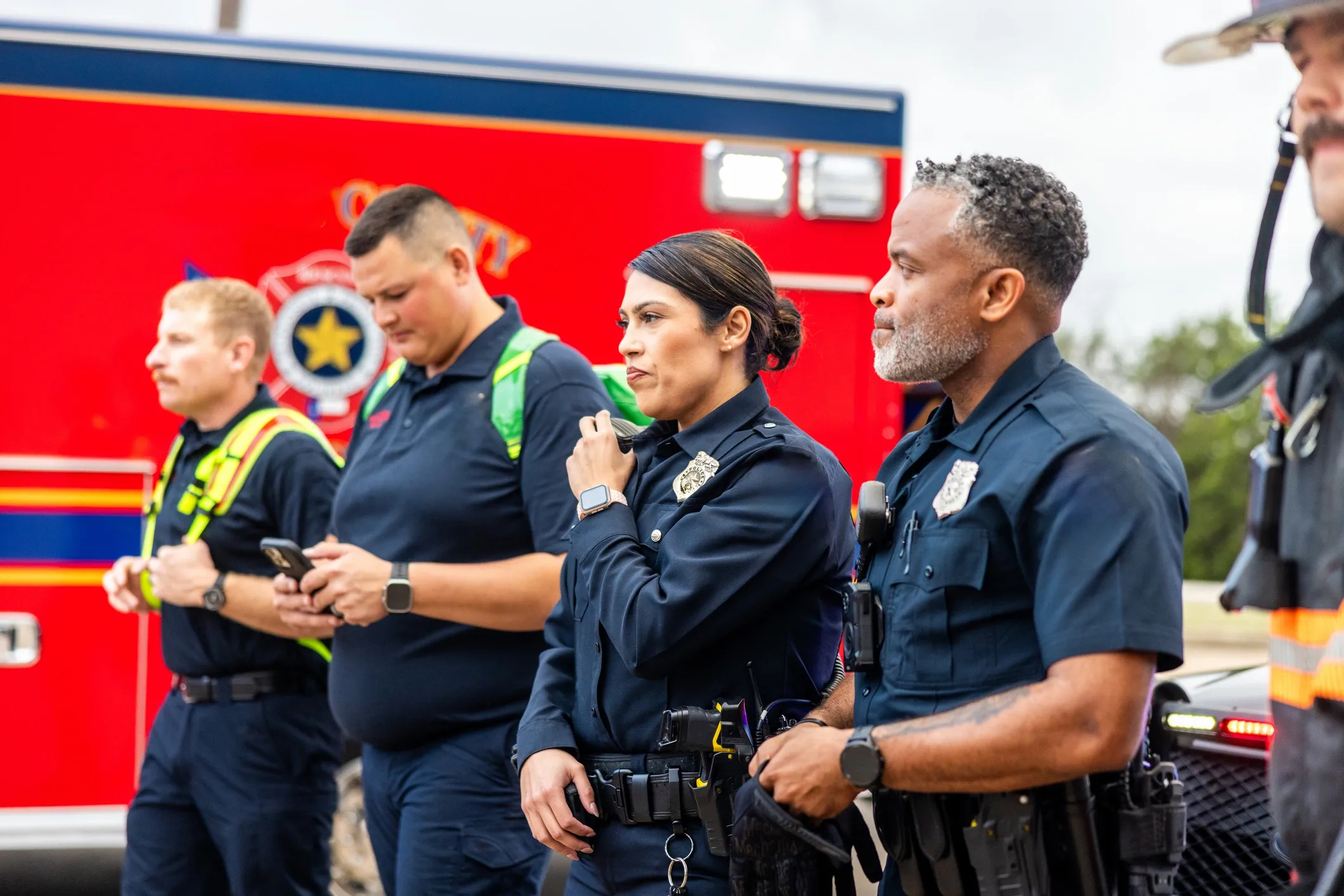 Public safety responders near emergency vehicle